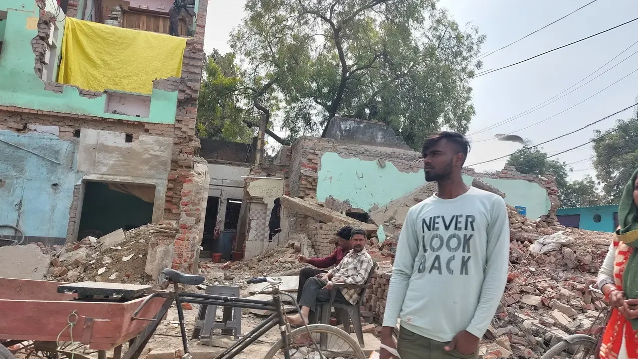 A scene of ruins and daily life in the suburbs of Varanasi, India.
