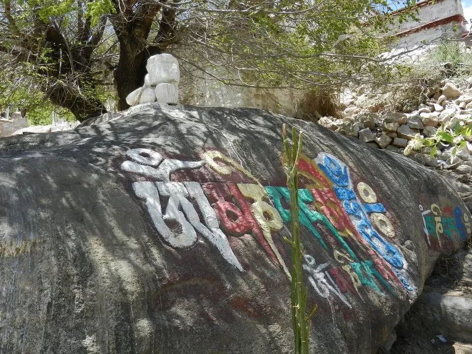 Mural painting on a large rock in the Himalayas.